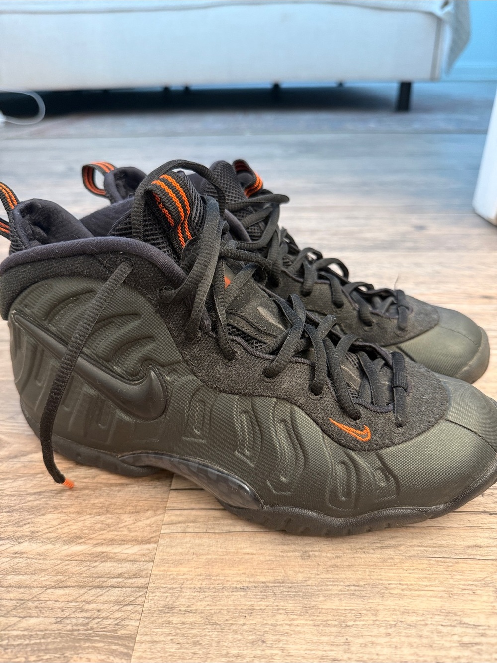 Nike Men’s Black Sneakers with Orange Accents